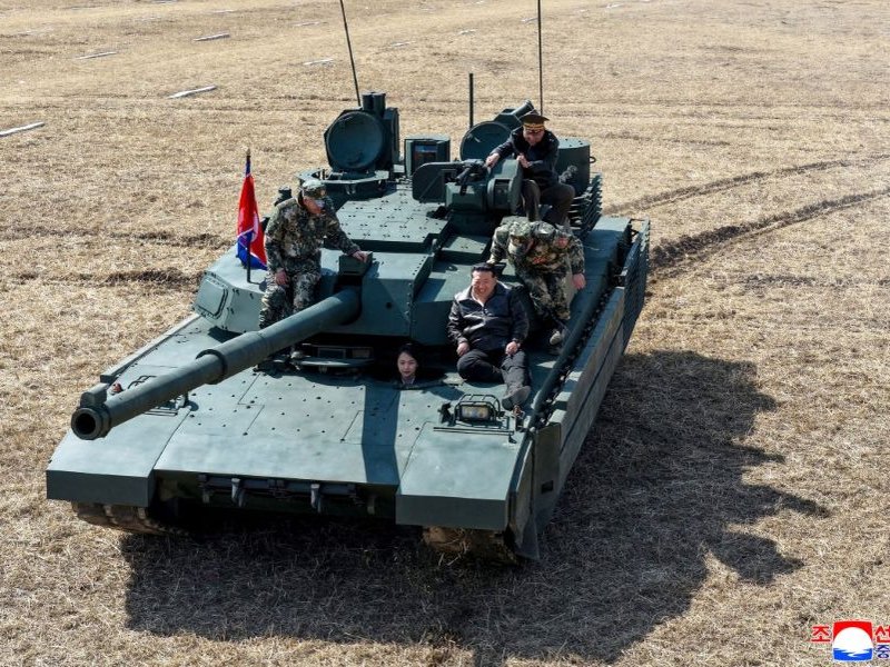 North Korean leader, daughter try out new tank