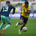 Germany's defender #13 Pascal Gross and Ecuador's midfielder #19 Gonzalo Plata fight for the ball during the 2026 World Cup