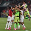 Morocco players celebrate after winning in the shootout