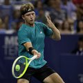 Alejandro Davidovich Fokina of Spain returns a shot against Taylor Fritz of the United States