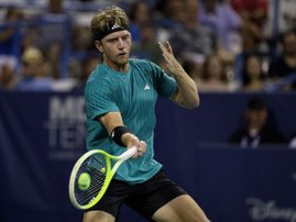 Alejandro Davidovich Fokina of Spain returns a shot against Taylor Fritz of the United States