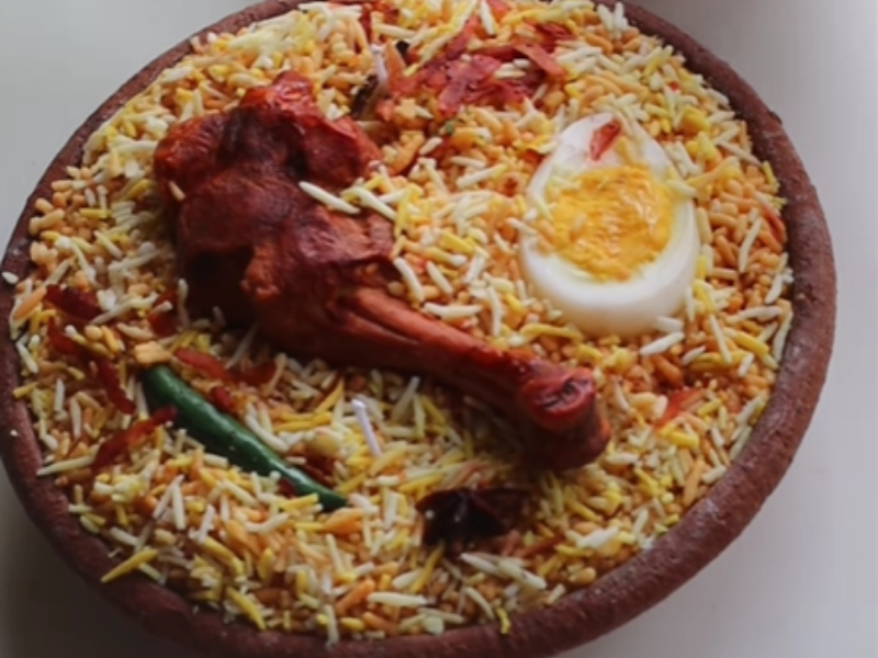 A Chicken Biryani themed candle