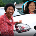 A Korean woman cheerful over getting her licence