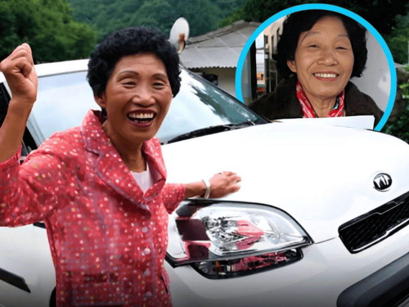 A woman is cheery after getting her licence