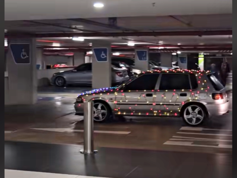 A Toyota Tazz decorated with Christmas lights