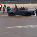 A bakkie gets stuck in the sea sand at KZN beach