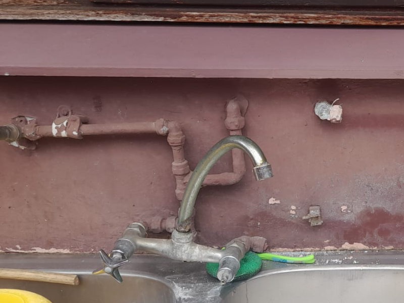 A basin tap with missing copper pipes