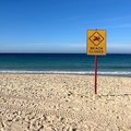A beach closed sign is displayed at Coogee Beach in Sydney