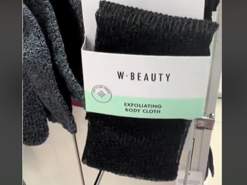 A black exfoliating body scrub from Woolworths
