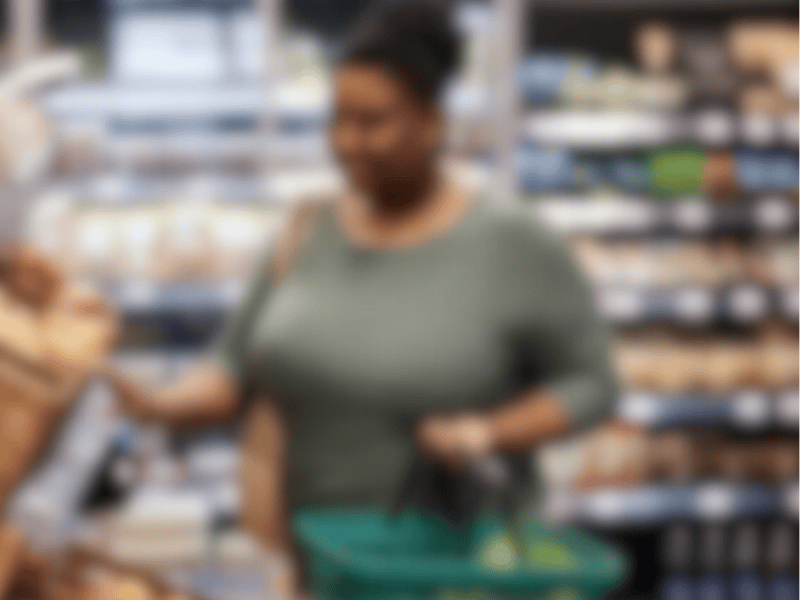 A black woman shopping for groceries