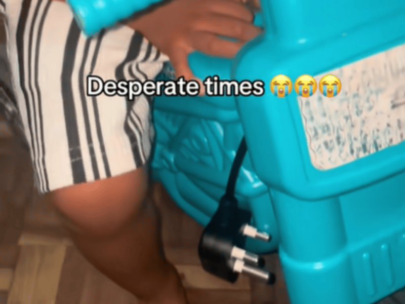 A boy sits on his Checkers Sixty60 bike with a plug on it
