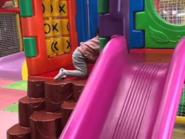 A child playing in a kids play area in Durban