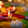 A clay diya lamp lit with wick and oil during Diwali celebration