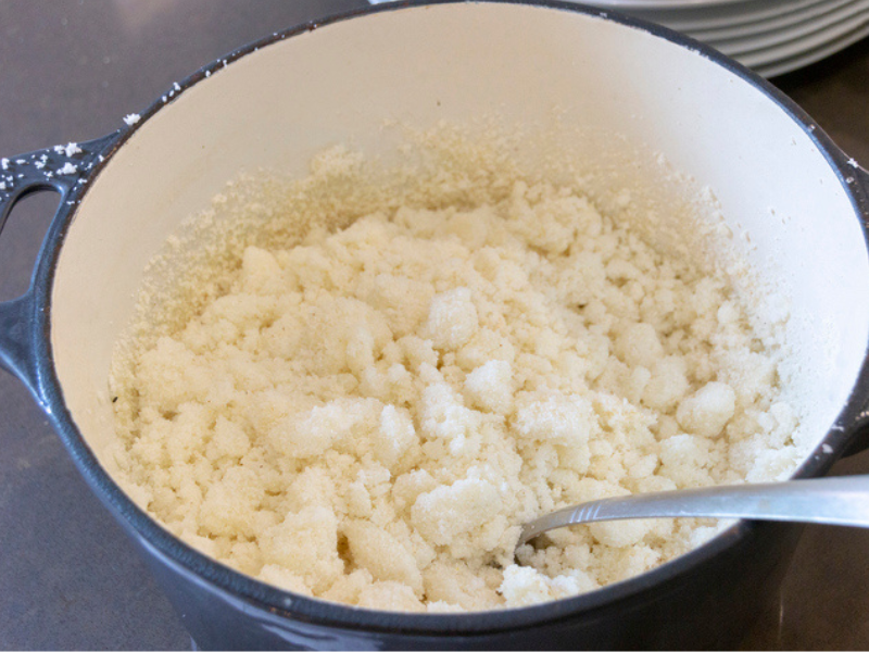 A close up view of pot with South African pap mealie meal