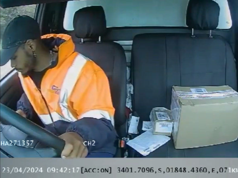 A driver uses his cellphone whilst driving