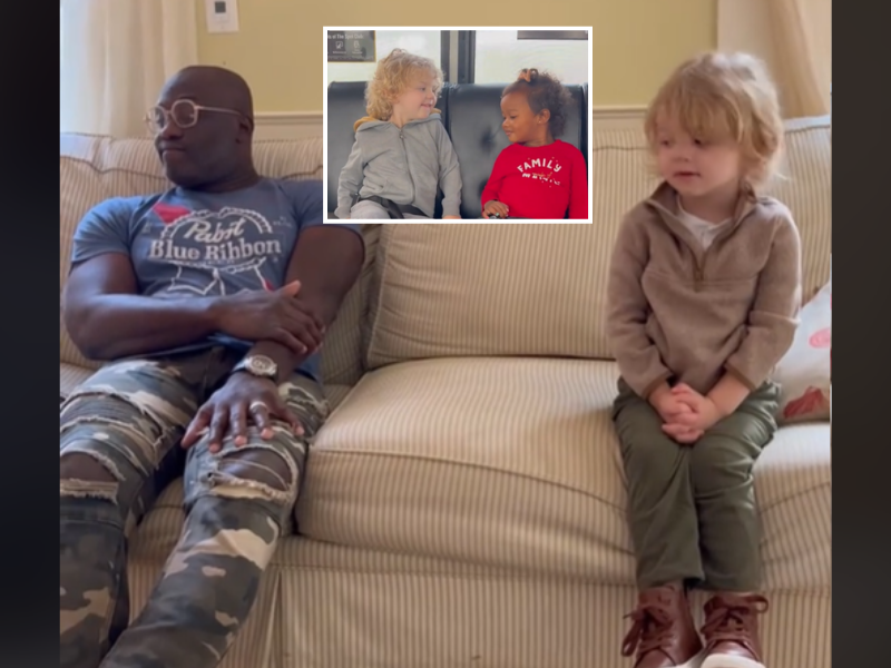 A father sitting next to his daughter