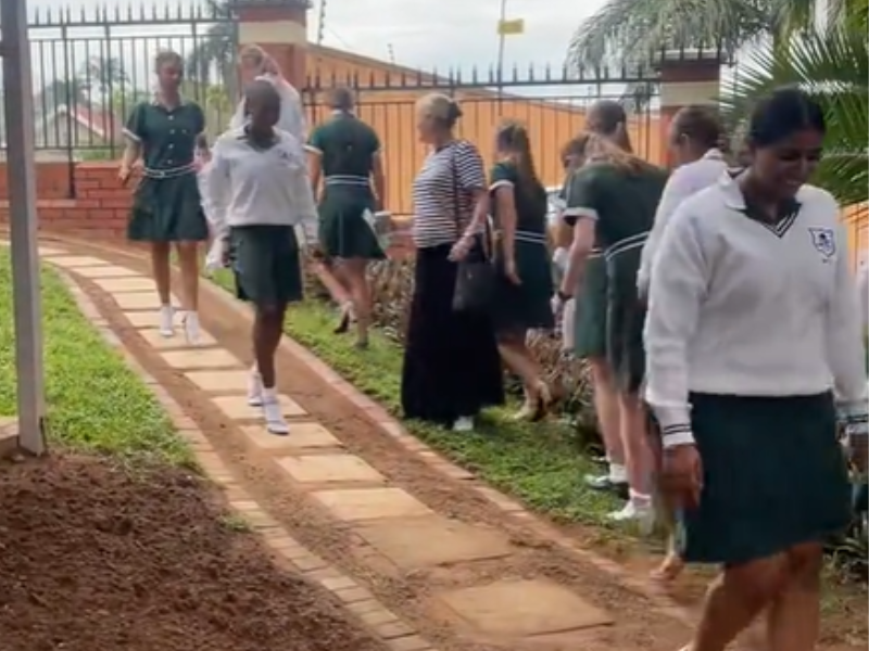 A group of girls from a Durban school parade with high heels on