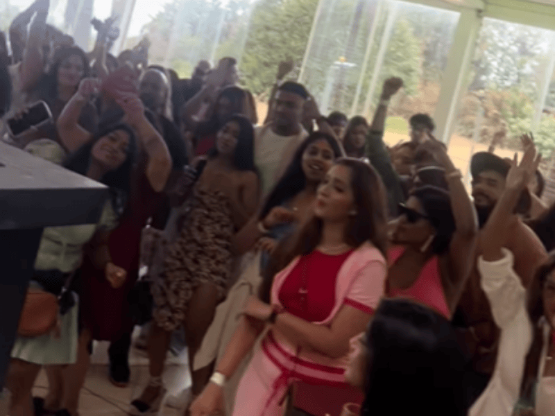 A group of people dancing at a coffee rave in Durban