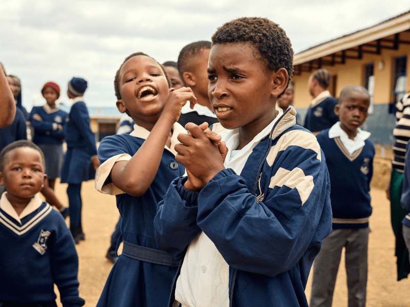 A group of school children at the ECR and PnP season of sharing food deliver 2024