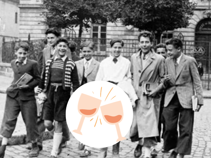 A group of teenagers walking on the streets of France in the 1900s