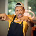A happy cafe worker having fun at the coffee shop