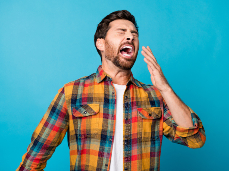 A man about to sneeze