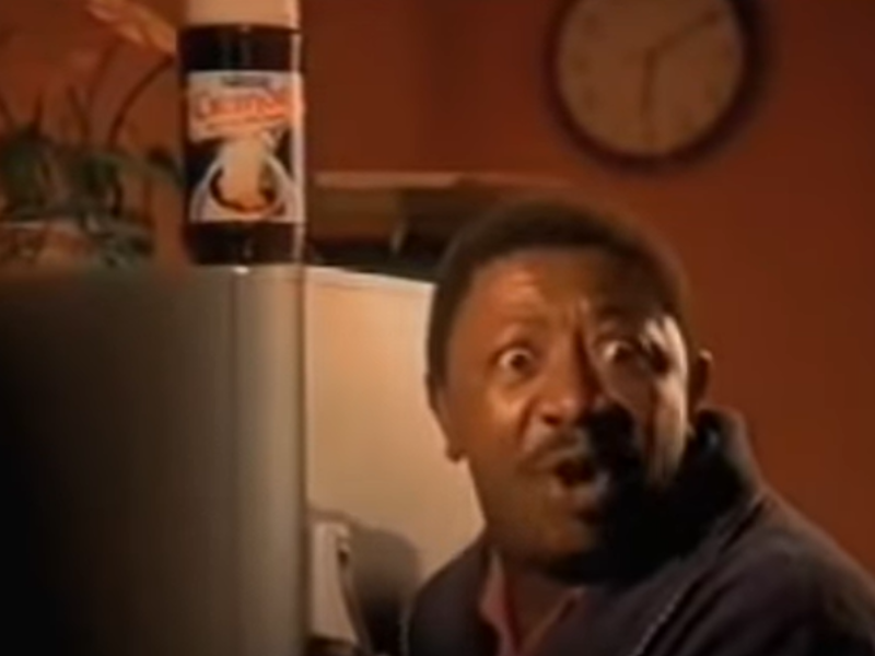 A man from the Cremora advert stands next to the fridge