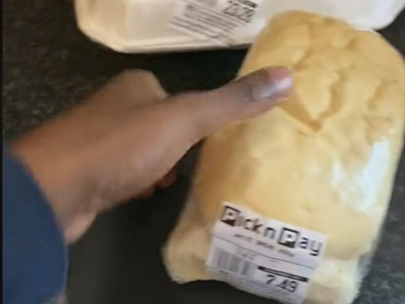 A man lays out all the food he purchased from Pick n Pay deli