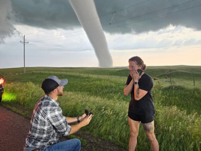 A man proposes to his girlfriend during a storm