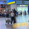 A man sets up a proposal at the King Shaka Airport