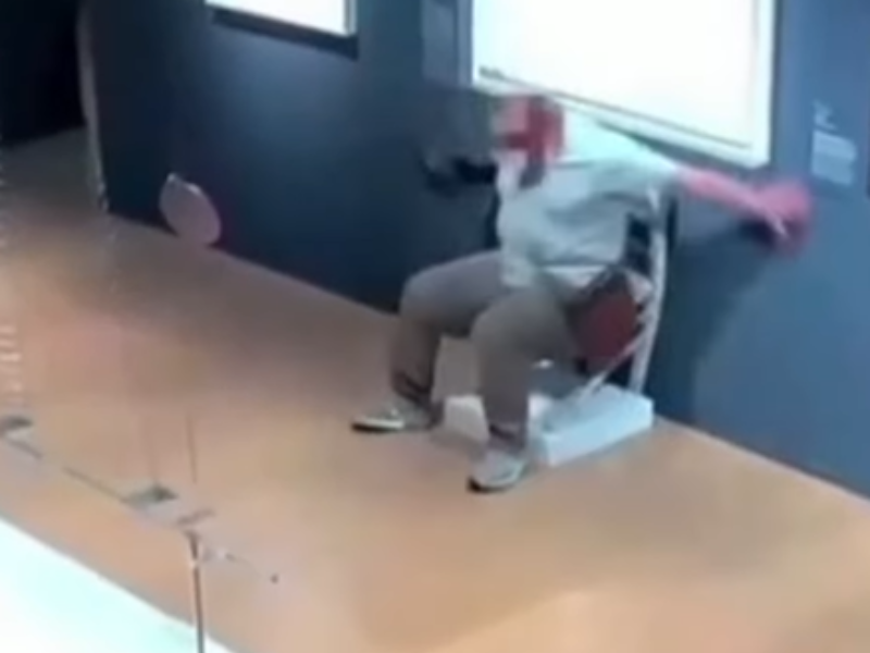A man sitting on the Van Gogh chair at Italian Museum