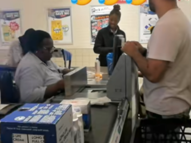 A man stands at the cashier inside a Pick n Pay store