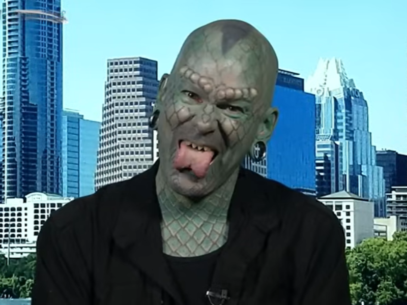 A man who has several body modifications