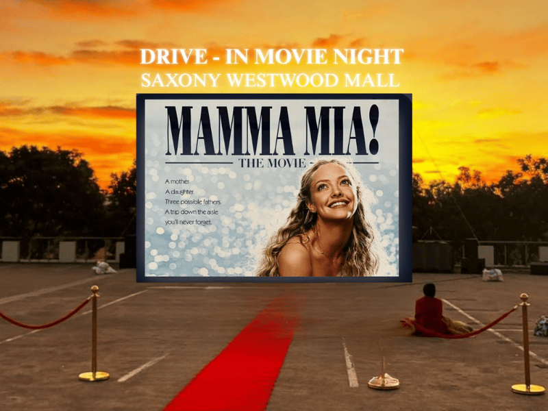 A movie poster for a drive in night on a rooftop