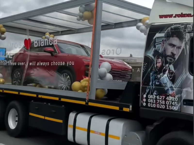 A new Jetour SUV being transported by a truck in Johannesburg