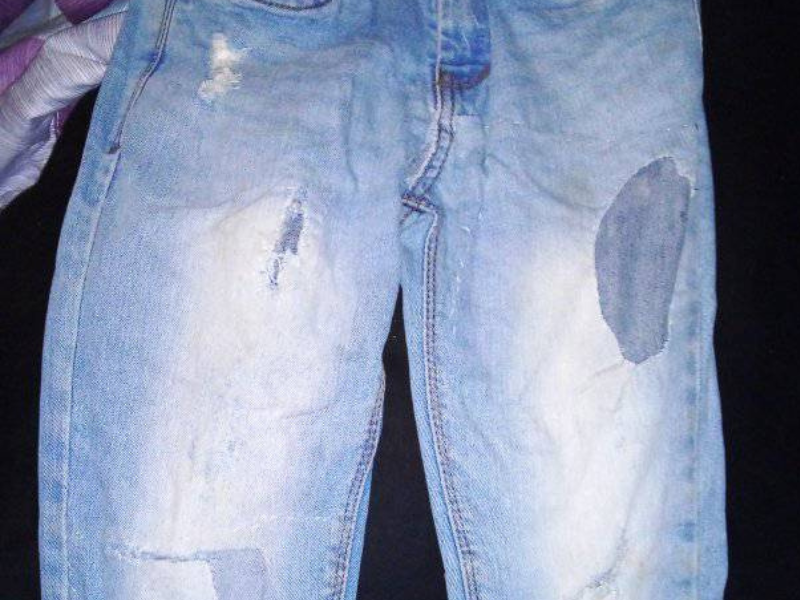 A pair of jeans that were mended