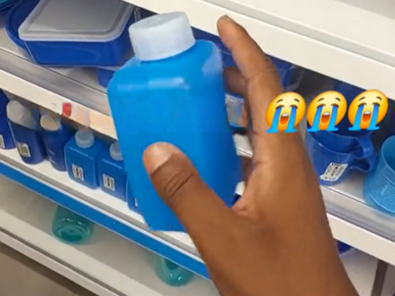 A person holding a juice or water bottle from Pep Stores