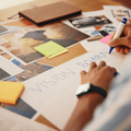 A person working on their vision board