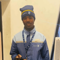 A petrol attendant wearing his Sasol uniform