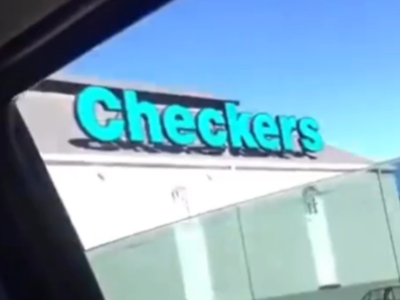 A photo taken of Checkers sign at a shopping centre