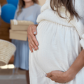 A pic of a pregnant woman with friends at her baby shower