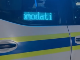 A led sign inside a vehicle that looks like a police car
