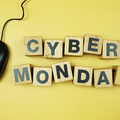 A poster for cyber Monday on a yellow background