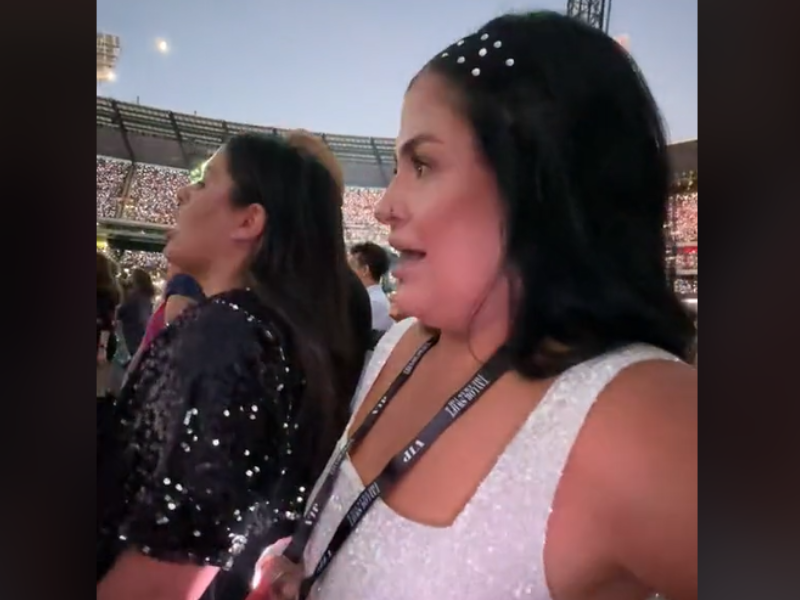 A pregnant woman at the Taylor Swift Era's concert
