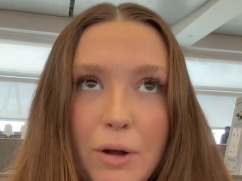 A red-handed woman with a nose ring