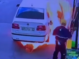 A vehicle catches alight at the petrol station