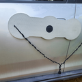 A vehicle door protector