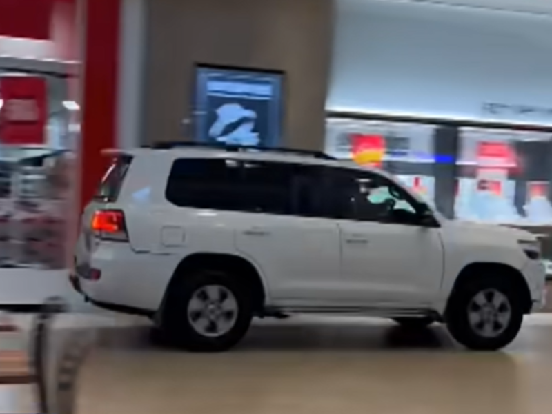 A vehicle driving through a mall in Australia