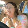 A woman loses control of her vehicle while videoing herself
