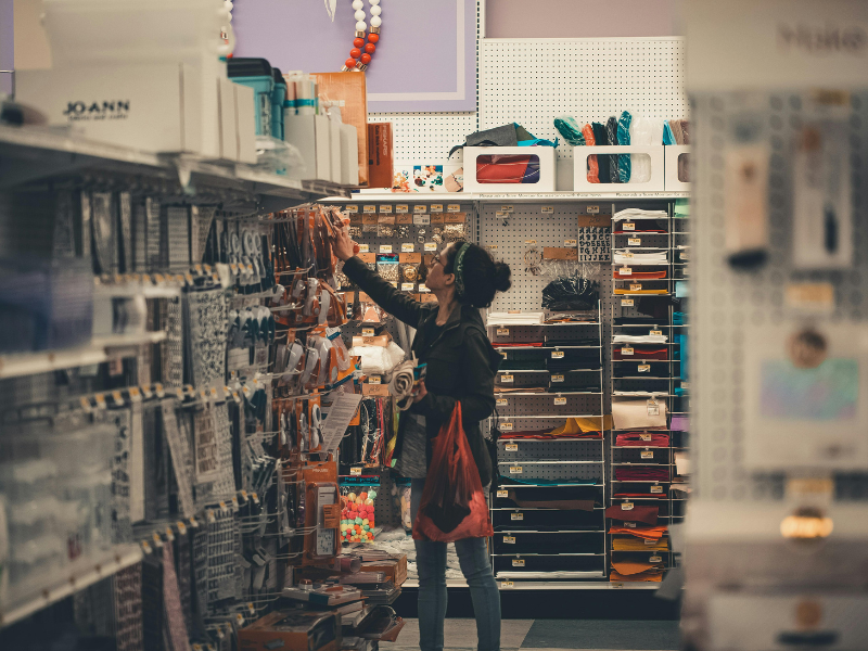 A woman shopping inside a hardware store